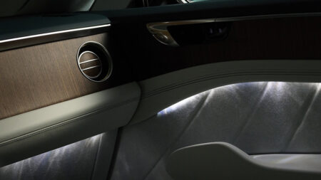 Bentley Torcal Brings Merino Wool and Layered Walnut Into the Cabin Bentley Torcal cabin with Merino wool upholstery, Ombre Veneer and Sunburst Aluminium details