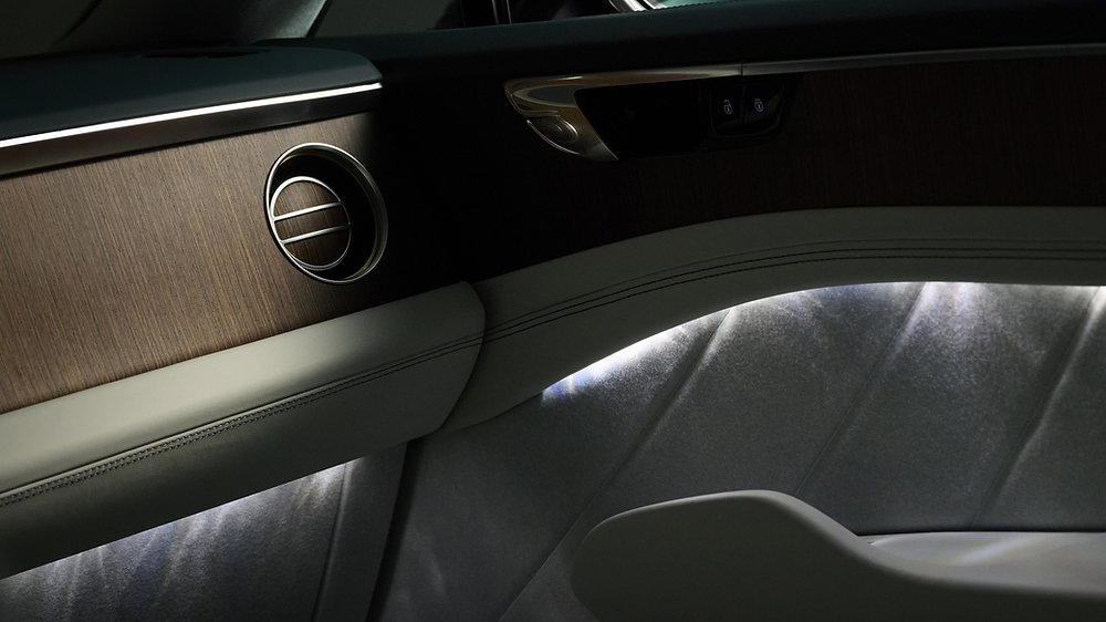 Bentley Torcal Brings Merino Wool and Layered Walnut Into the Cabin Bentley Torcal cabin with Merino wool upholstery, Ombre Veneer and Sunburst Aluminium details
