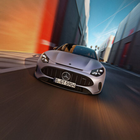 Mercedes-AMG GT 53 4-Door Coupé Brings 544 HP Electric Performance Mercedes-AMG GT 53 4-Door Coupé driving on a sweeping road at dusk
