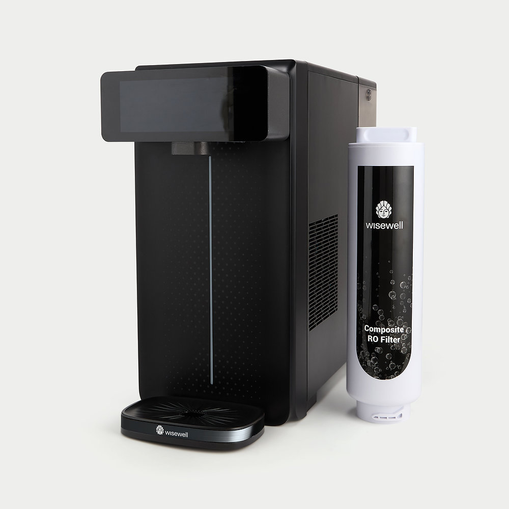 Wisewell Sparkle Brings Still and Sparkling Water to One Countertop System Wisewell Sparkle countertop water purifier dispensing still and sparkling water in a modern kitchen