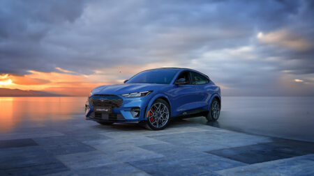 Ford Mustang Mach-E Turns an American Icon Electric Ford Mustang Mach-E GT electric SUV on an open road