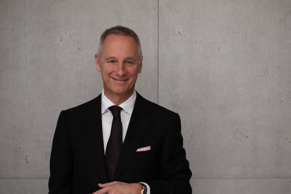 Wilhelm Schmid of A. Lange & Söhne wearing a watch in a refined editorial portrait