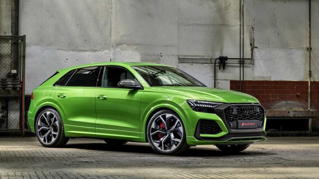 Audi Q8 luxury coupe-SUV driving on a modern road