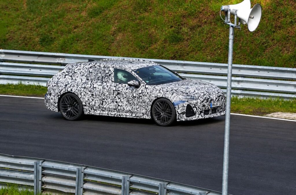 Next-generation Audi RS6 Avant imagined as a low, wide performance wagon on a road