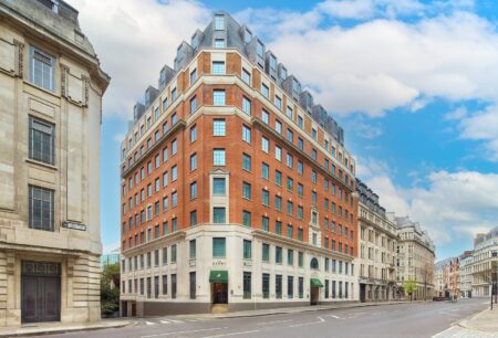 The Derby London City Opens in the Square Mile Guest room and City skyline view at The Derby London City Curio Collection by Hilton