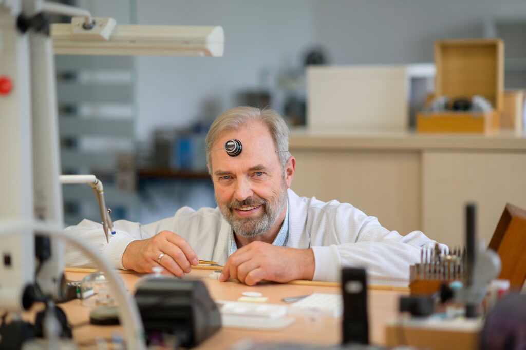 Bernhard Lederer watchmaking portrait with mechanical movement components