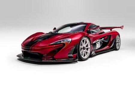 Lanzante’s Road-Legal McLaren P1 HDK Heads to Monterey Cherry Bomb Red McLaren P1 HDK by Lanzante with black stripes and fixed rear wing