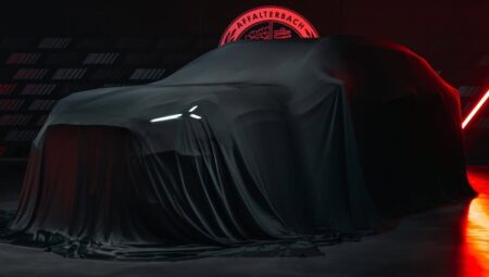 Mercedes-AMG Teases a High-Performance Electric SUV Teased Mercedes-AMG electric performance SUV under cover with LED lighting