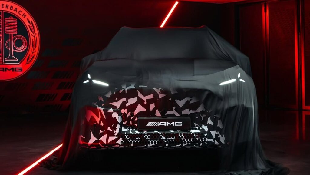 Camouflaged Mercedes-AMG electric performance SUV preview showing the front end and LED lighting
