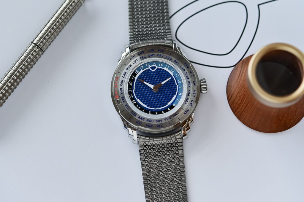 Ming 57.05 Comet Makes the Worldtimer Smarter About Daylight Saving Ming 57.05 Comet worldtimer with blue Comet Tail dial and steel case