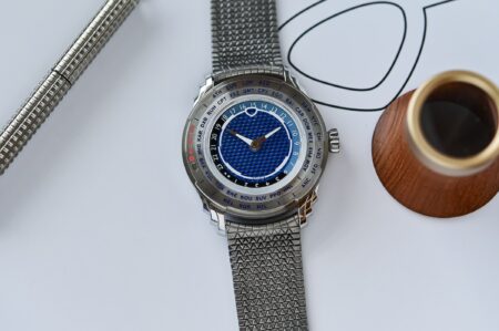 Ming 57.05 Comet Makes the Worldtimer Smarter About Daylight Saving Ming 57.05 Comet worldtimer with blue Comet Tail dial and steel case