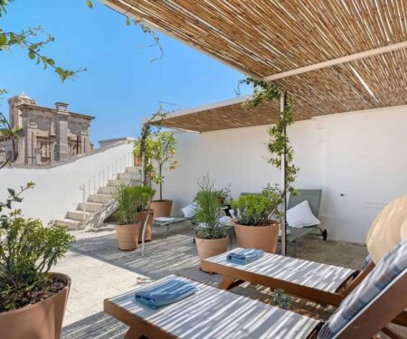 Inside Salento’s New Palazzo Stay Culture Restored palazzo rooftop terrace overlooking a historic town in Salento, Puglia