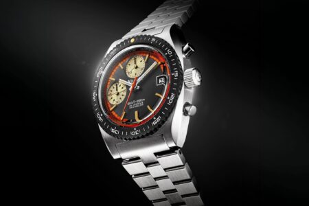 Nivada Grenchen Autochron Automatic Orange Brings 1970s Motorsport Energy Back to the Wrist Nivada Grenchen Autochron Automatic Orange chronograph with black dial and orange accents