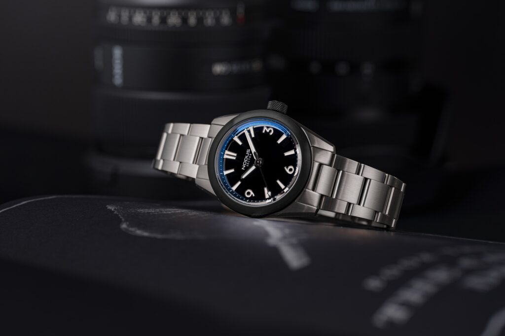 Nodus Brings Stone Dials Into the Sector II Lineup Nodus Sector II Sport Tiger’s Eye and Onyx watches with Holme and Hadfield Sector II Dive special edition