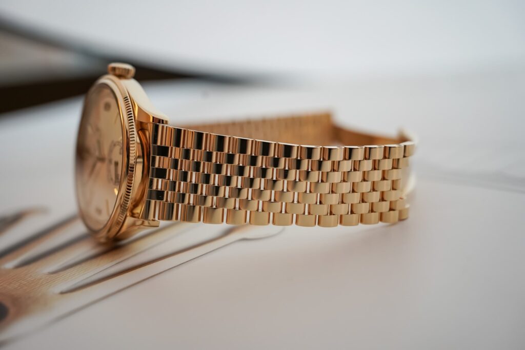 The ABCs of Time and the Rise of the Metal Watch Bracelet Vintage wristwatch fitted to a stainless steel metal bracelet showing articulated links and clasp detail