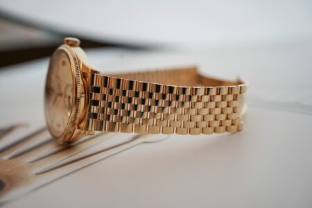 The ABCs of Time and the Rise of the Metal Watch Bracelet Vintage wristwatch fitted to a stainless steel metal bracelet showing articulated links and clasp detail