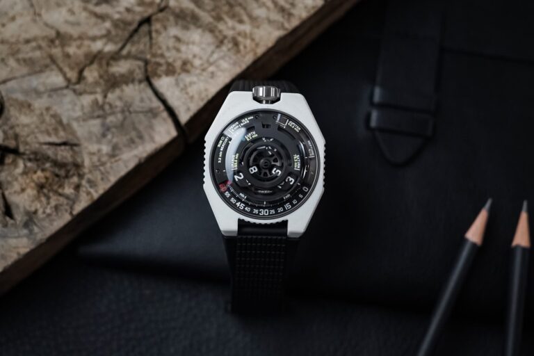 Urwerk UR-100V Lightspeed Ceramic Makes Cosmic Time Wearable Urwerk UR-100V Lightspeed Ceramic watch with white composite case and black satellite-hour dial