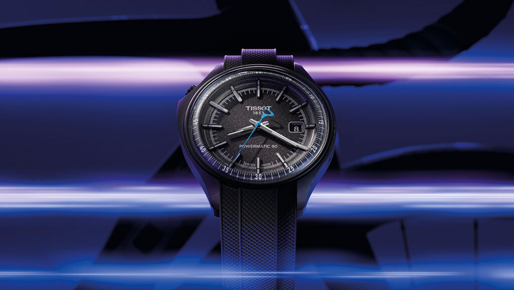 Tissot x Pinarello Brings Carbon Cycling Design to the Wrist Tissot x Pinarello carbon fiber watch with frosted gray dial and blue seconds hand