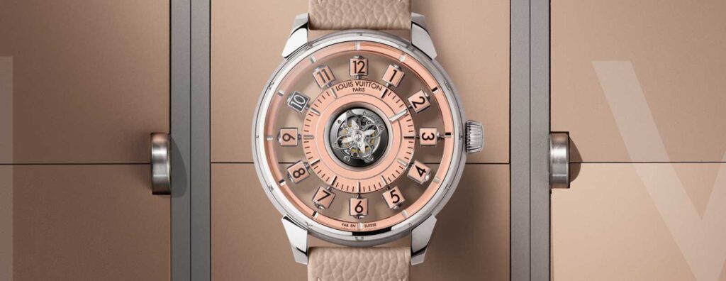 Louis Vuitton Tambour Spin Time watches in green, blue, opal and salmon dial variations