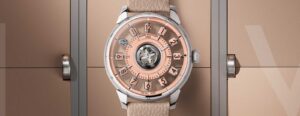 Louis Vuitton Tambour Spin Time watches in green, blue, opal and salmon dial variations
