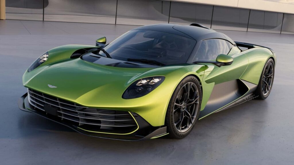 Aston Martin Valhalla Spider Expected to Add Open-Air Drama in 2026 Aston Martin Valhalla Spider open-top hybrid supercar concept on a mountain road