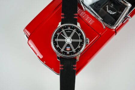MeisterSinger Brings Route 66 Spirit to a Mustang-Inspired Single-Hand Watch MeisterSinger Edition Route 66 watch with Mustang-inspired black dial and red-stitched leather strap