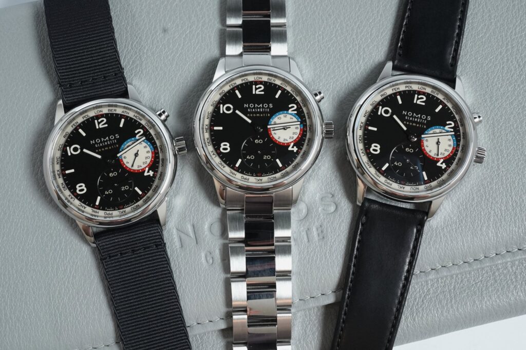 Nomos Club Sport Neomatik Worldtimer Dark with black luminous dial on steel bracelet