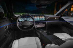 Modern Nissan-style car interior with touchscreen and physical controls
