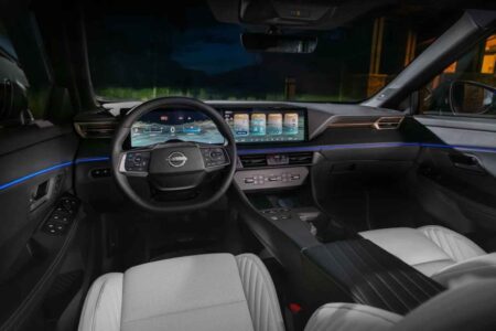 Modern Nissan-style car interior with touchscreen and physical controls