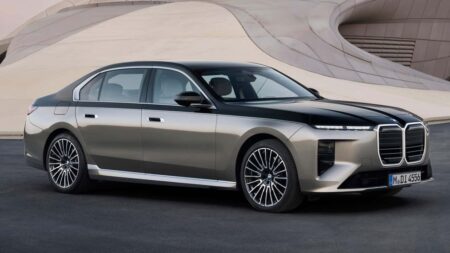 BMW Recalls 189,130 Luxury Sedans Over Starter Motor Fire Risk BMW 3 Series, 5 Series and 7 Series sedans lined up outside a dealership