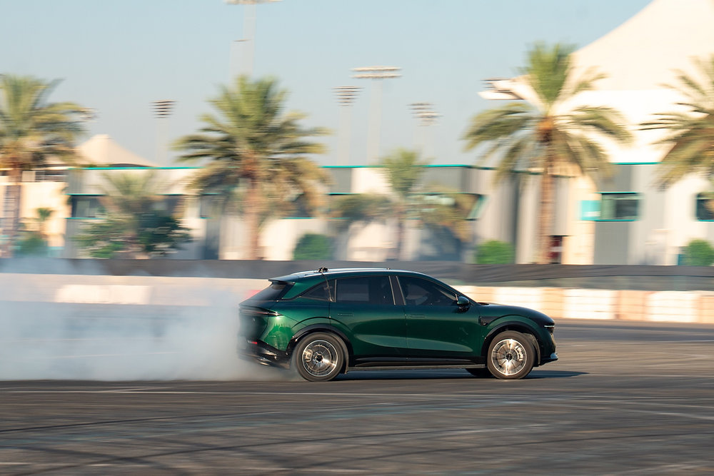 Zeekr 7X Marks a Guinness World Records Milestone at Yas Marina Circuit Zeekr 7X drifting through a narrow gap at Yas Marina Circuit