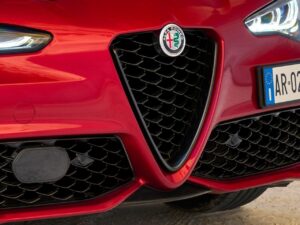 Alfa Romeo red sculpted concept car body teaser for Paris Motor Show 2026