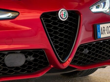 Alfa Romeo red sculpted concept car body teaser for Paris Motor Show 2026