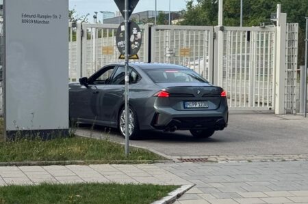 Next BMW 3 Series Shows Its Neue Klasse Rear End in Munich Dark next-generation BMW 3 Series sedan prototype seen from the rear in Munich
