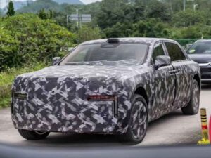 Teaser view of Yangwang BYD flagship luxury sedan with coach doors and LED headlights