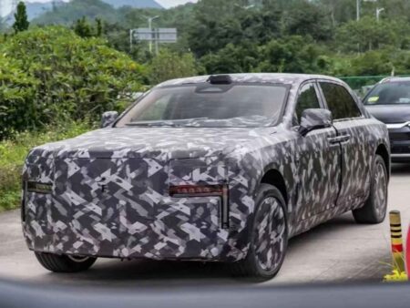 Yangwang Teases BYD’s Most Ambitious Luxury Sedan Yet Teaser view of Yangwang BYD flagship luxury sedan with coach doors and LED headlights