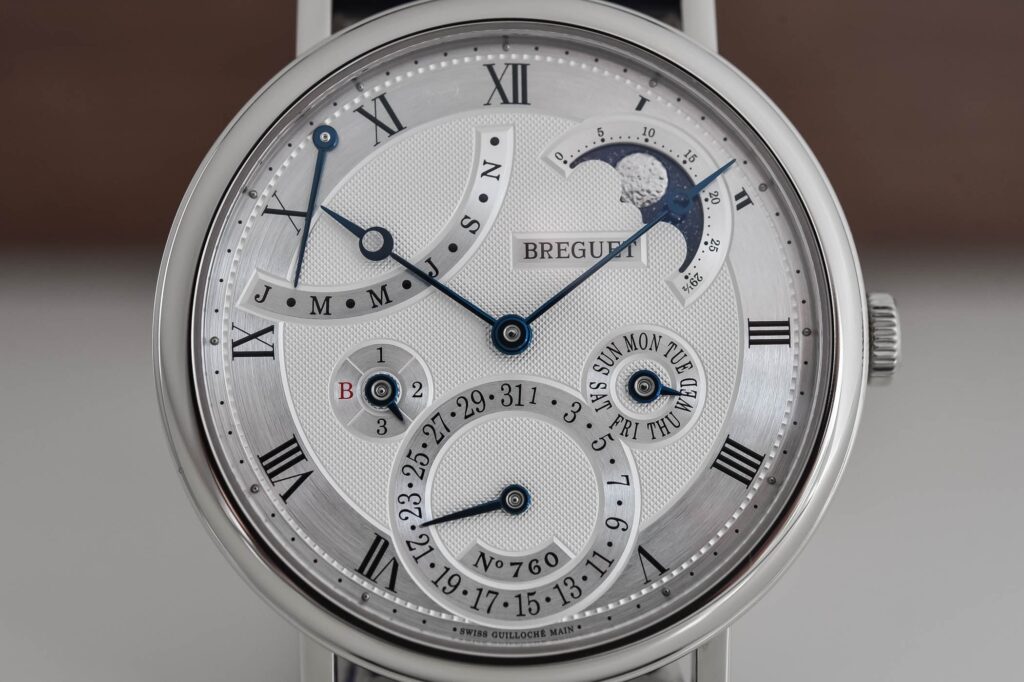 How Watch Dial Materials Shaped the Face of Time Close view of a luxury watch dial showing fired enamel texture and polished hands