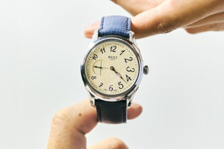 Buci Nouvelle Turns the Short Story Into a Compact Hand-Wound Watch Buci Nouvelle watch with textured dial and calligraphic numerals