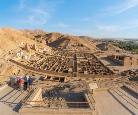 Ancient stone ruins on Luxor’s West Bank in warm desert light