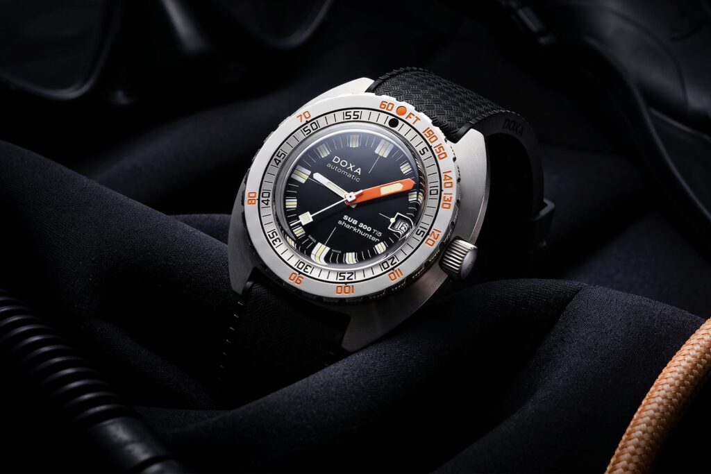 Doxa Brings Grade 5 Titanium to the SUB 300 Doxa SUB 300 Ti5 titanium dive watch with colourful dial and rubber strap