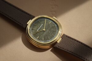 Gérald Genta Geneva Minute Repeater Golden Obsidian watch with yellow gold cushion case and brown leather strap