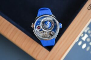 Greubel Forsey Shrinks the GMT Balancier Convexe and Turns Up the Blue Greubel Forsey GMT Balancier Convexe in blue with rotating globe and inclined balance wheel
