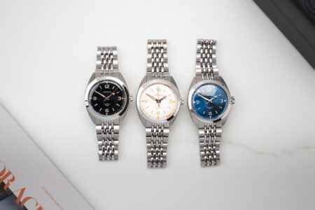 Héron Continental brings everyday sport-watch practicality to 37mm Héron Continental automatic sports watch with sandwich dial on a stainless steel beads-of-rice bracelet