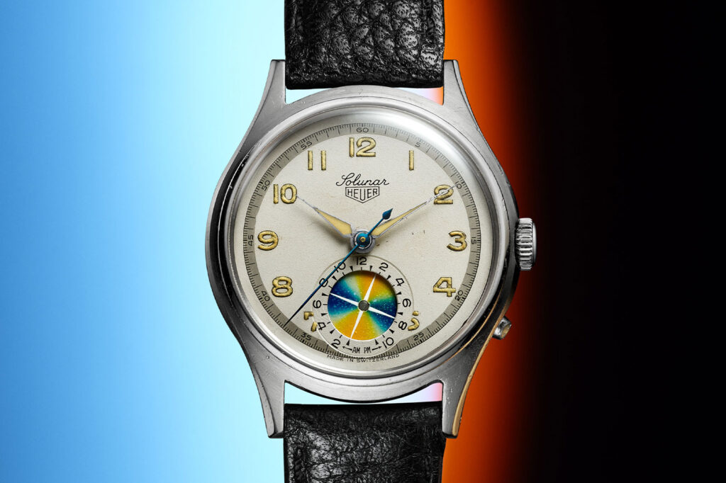 The Heuer Solunar Was Jack Heuer’s First Great Problem Watch Vintage Heuer Solunar wristwatch with tide display aperture on the dial