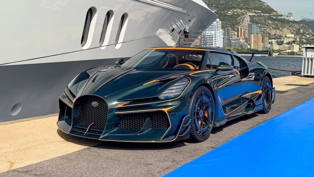 Mansory Bugatti Mistral Vincero in dark green with orange accents at Port Hercule in Monaco