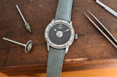 Marcu Initial Gives a Veteran Watchmaker His Own Signature Marcu Initial watch in grade 5 titanium with diamond-tipped hands and visible hand-wound movement