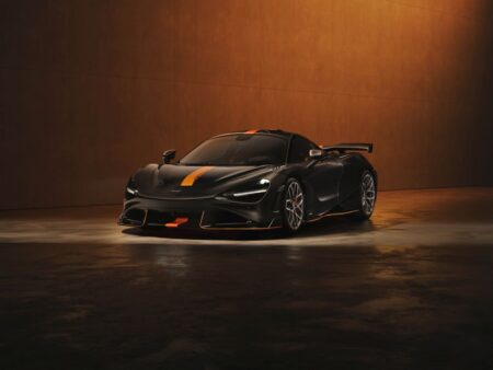 McLaren’s Next Era May Stretch From Hybrid Supercars to an SUV McLaren supercar silhouette in a modern showroom hinting at future SUV and GT models