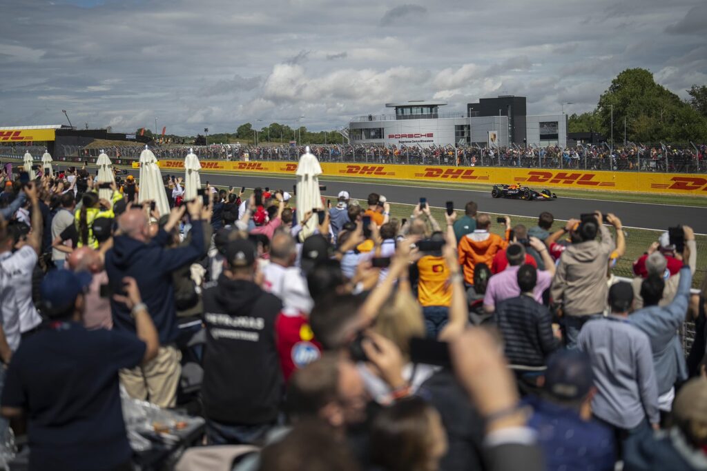 Silverstone Opens 2027 British Grand Prix Hospitality After a Record F1 Weekend Formula 1 cars racing at Silverstone during the British Grand Prix with premium hospitality terraces nearby