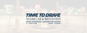 Luxury watches displayed beside classic performance cars at a Miami collector festival