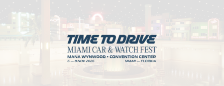 Luxury watches displayed beside classic performance cars at a Miami collector festival